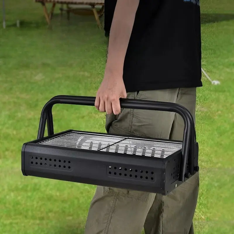 Portable Charcoal Grill with Folding Handles and Perforated Sidewalls for Camping