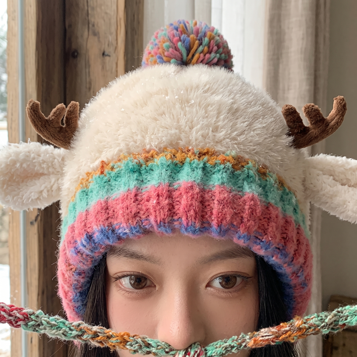 Women's Knit Reindeer Ear Flap Winter Beanie Hat with Antler Details and Braided Ties