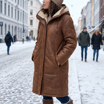 Brown long winter down jacket worn on snowy street b12-56d3e8b3